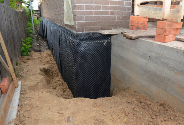 Happy homeowners after waterproofing job in East Fultonham